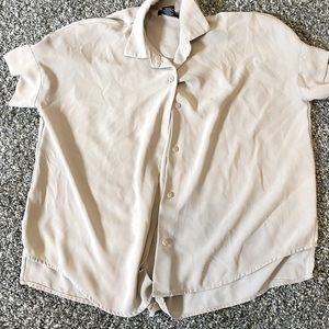 Over sized work blouse. Size extra small fits like a medium